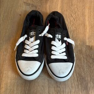 Levi's Black and White Flats with Classic Design